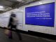 A Polymarket advertisement in a subway station in New York, US, on Thursday, Feb. 5, 2026. Kalshi and Polymarket, which have been assailed by critics for encouraging financial risk taking by making betting more accessible, are now using the promise of free groceries to win over New Yorkers.