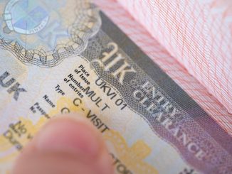a close-up shot of a UK visa in someone's passport.