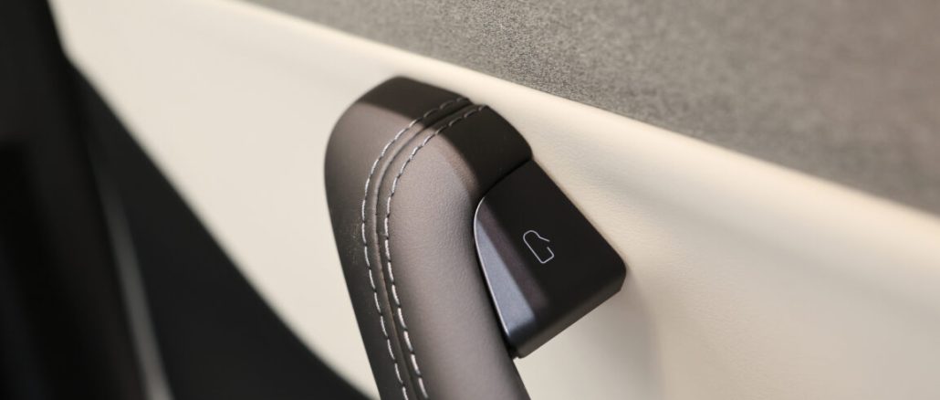 The interior door handle of a Tesla Model 3 electric vehicle at a pop-up Tesla Inc. store on its opening day in Riga, Latvia, on Friday, Aug. 21, 2026. Tesla Inc. and at least eight other carmakers are recalling millions of cars in China over safety concerns with their door handles. Photographer: Andrey Rudakov/Bloomberg via Getty Images