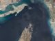 Iran rebuffs Trump's claim over Hormuz amid report of ship strike