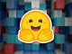 The Hugging Face logo in front of shipping containers.