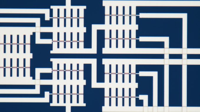Wafer-Scale Superconducting Transistors Cut Cryo Cables